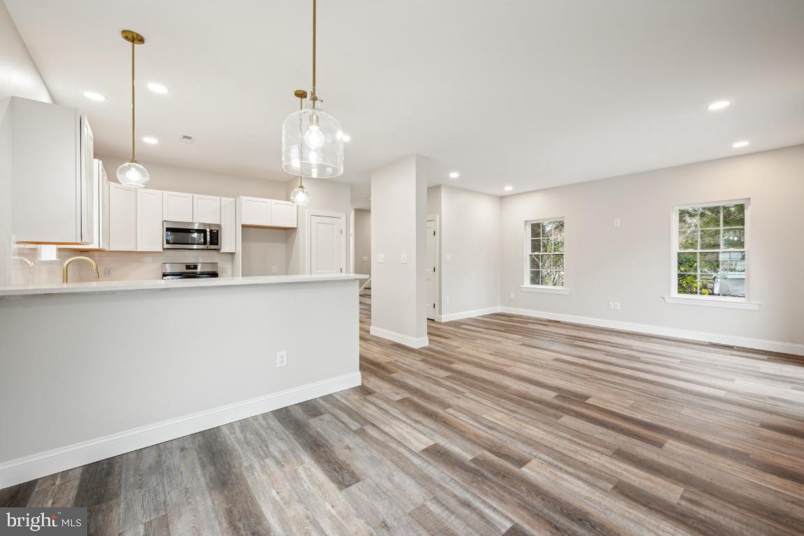 459 Berkley Road Mantua, NJ 08051 - Photo 6 of 28 a view of large kitchen with large window and stainless steel appliances