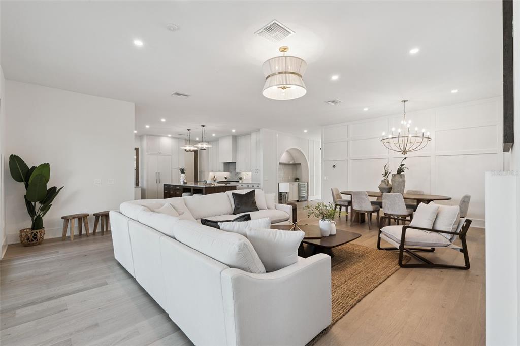 35 West Hazel Street Orlando, FL 32804 - Photo 22 of 60 a living room with furniture and a chandelier
