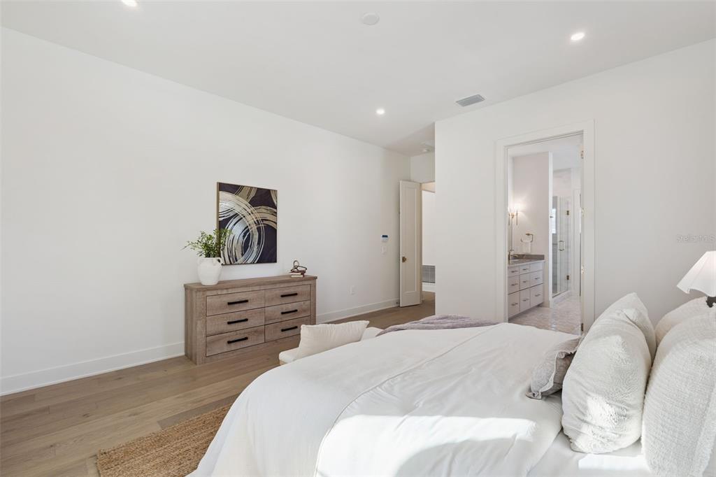 35 West Hazel Street Orlando, FL 32804 - Photo 29 of 60 a bedroom with a bed and a dresser