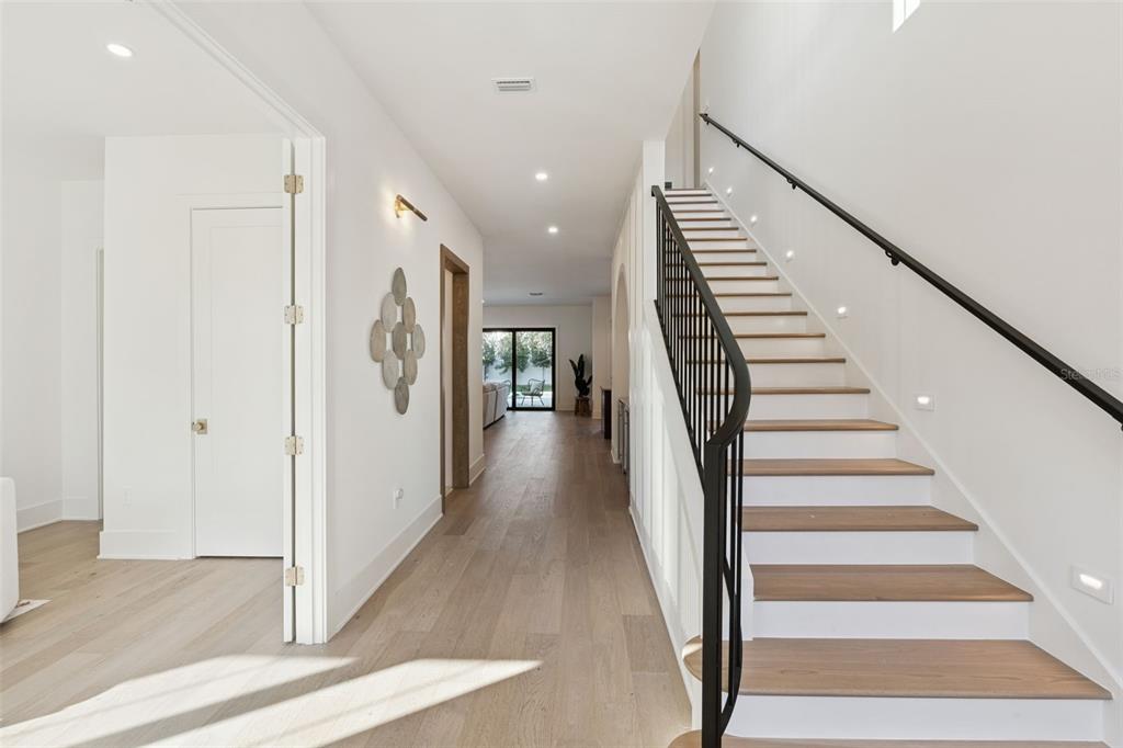 35 West Hazel Street Orlando, FL 32804 - Photo 3 of 60 a view of entryway and hall with wooden floor