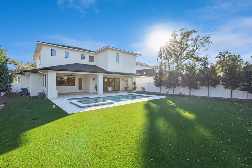 35 West Hazel Street Orlando, FL 32804 - Photo 48 of 60 a front view of a house with swimming pool having outdoor seating