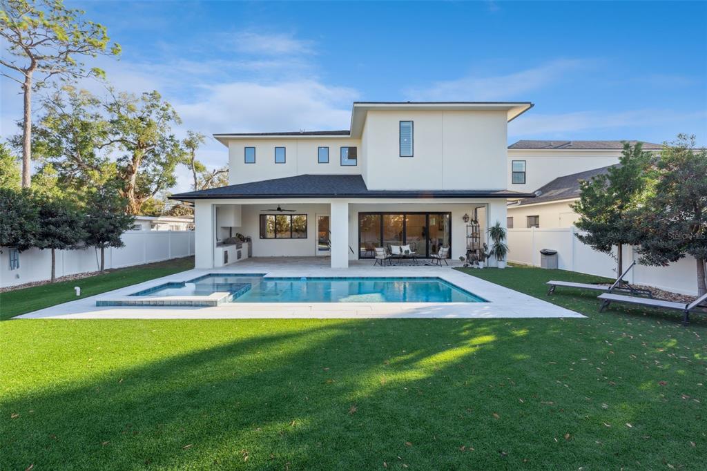 35 West Hazel Street Orlando, FL 32804 - Photo 49 of 60 a view of house with a big yard and potted plants