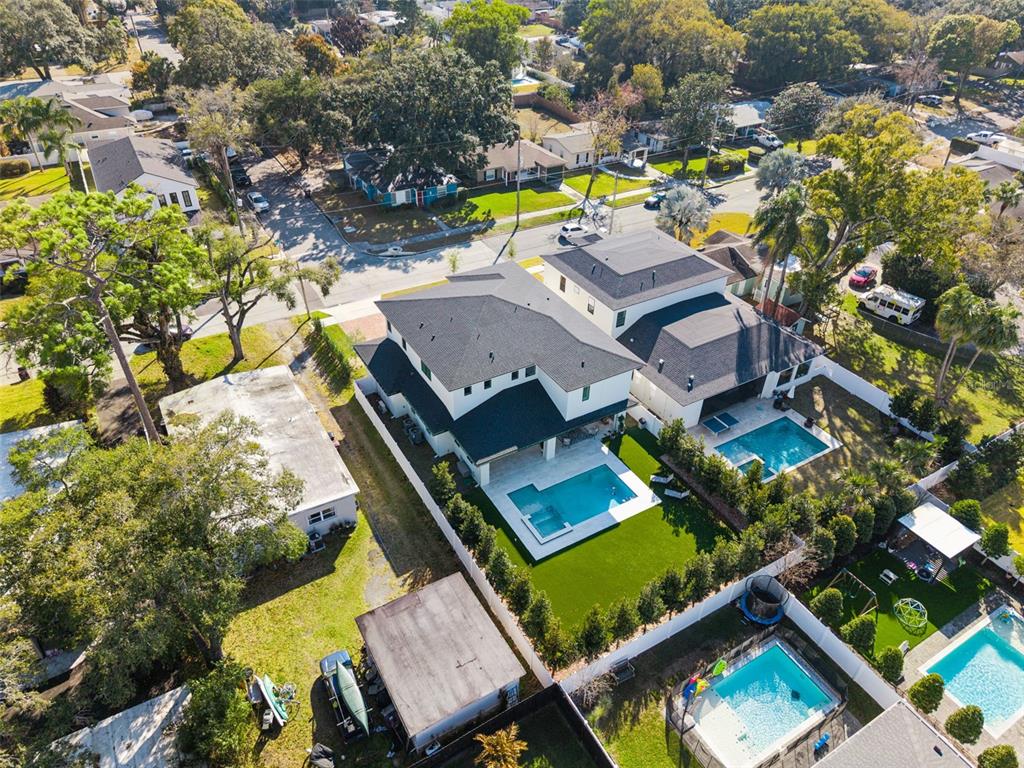 35 West Hazel Street Orlando, FL 32804 - Photo 55 of 60 an aerial view of a house with a garden and swimming pool