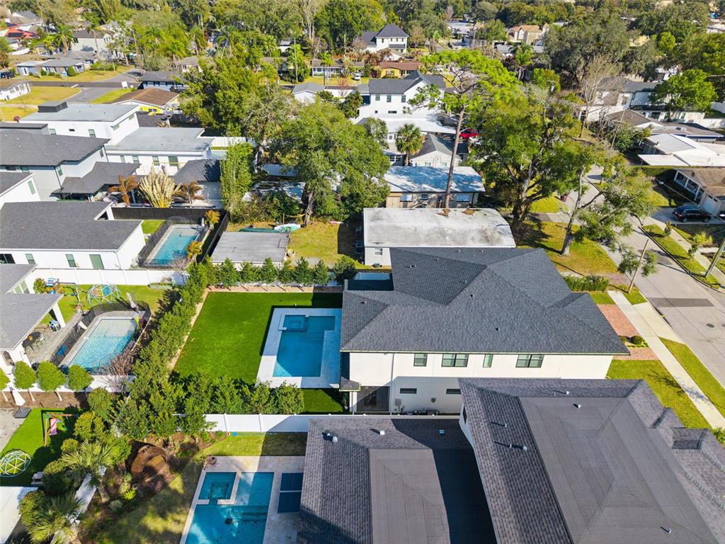 35 West Hazel Street Orlando, FL 32804 - Photo 57 of 60 an aerial view of residential houses with outdoor space and parking