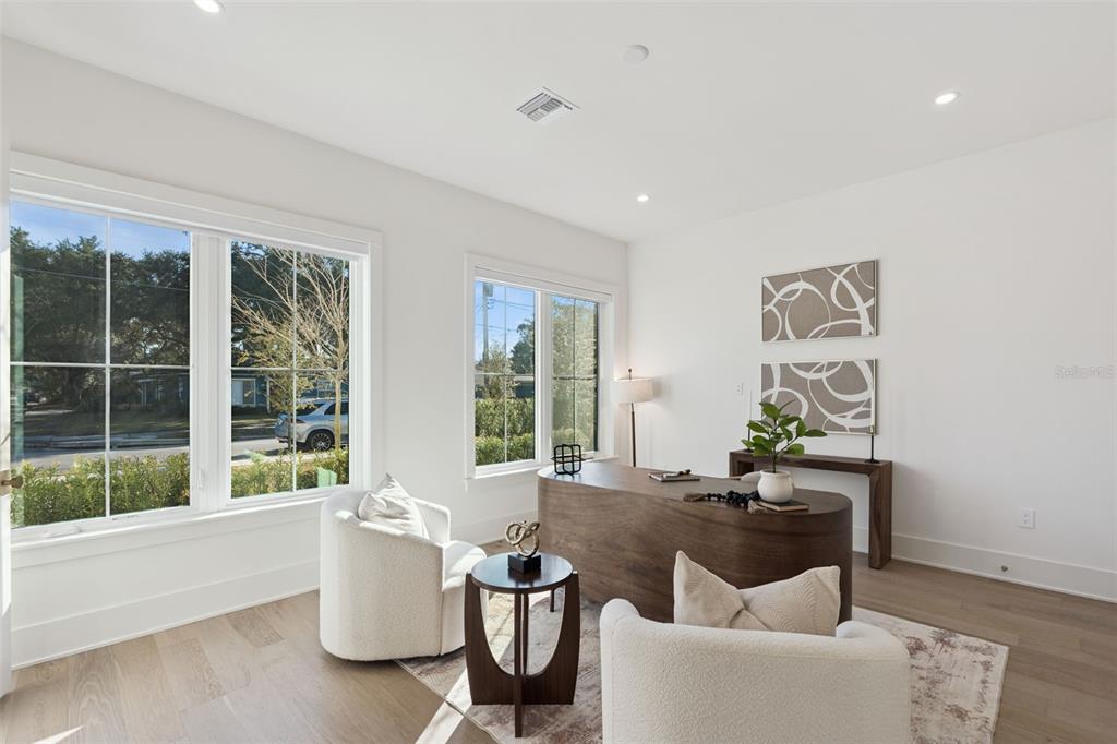 35 West Hazel Street Orlando, FL 32804 - Photo 7 of 60 a living room with furniture and window