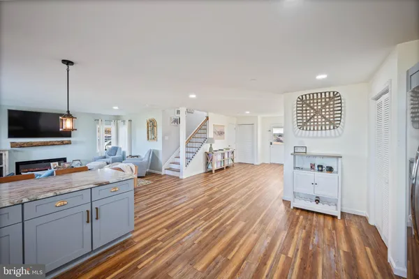 a view of a kitchen from the hallway