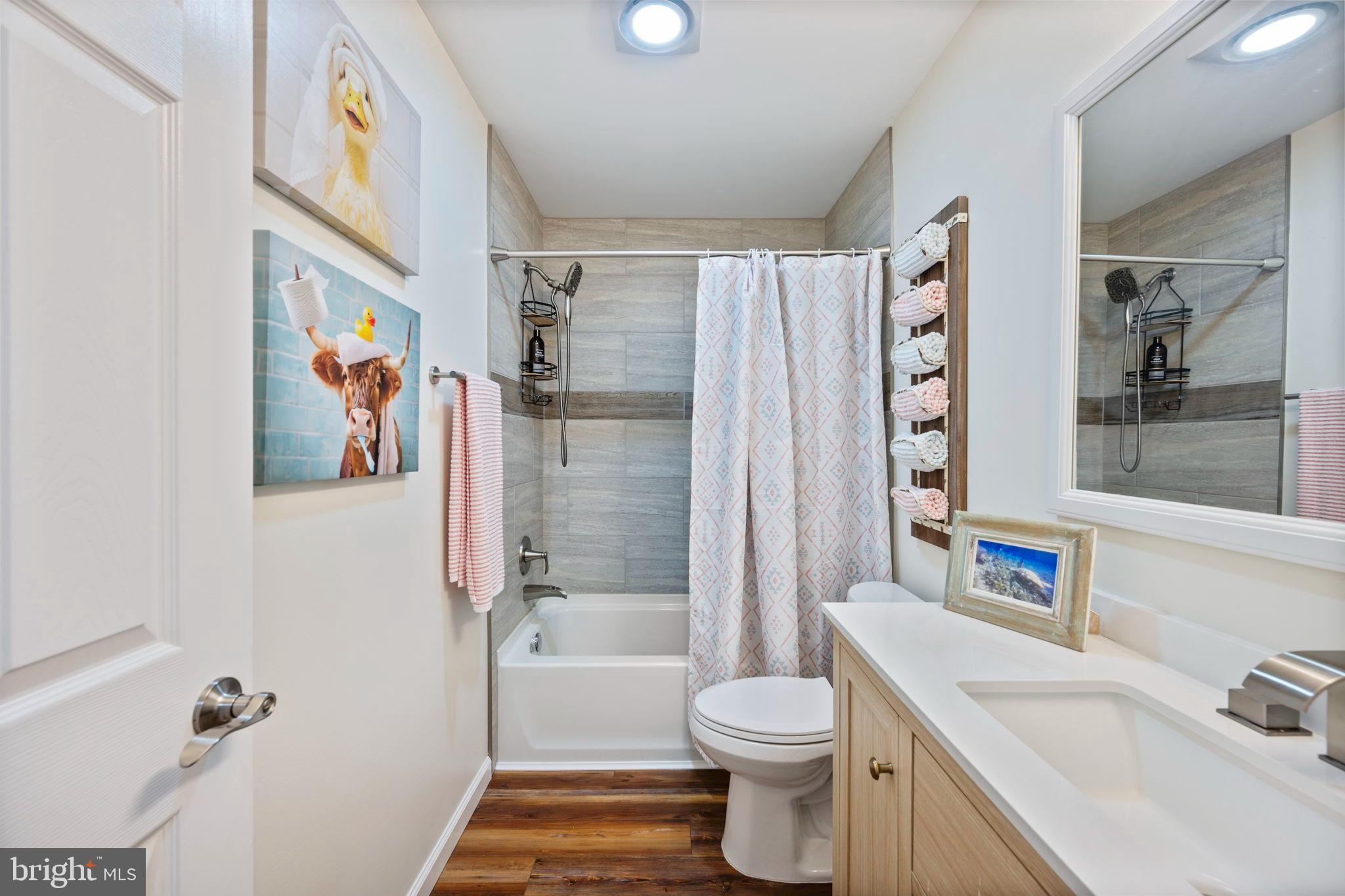 118 South Clear Ridge Road New Windsor, MD 21776 - Photo 19 of 44 a bathroom with a sink toilet and shower
