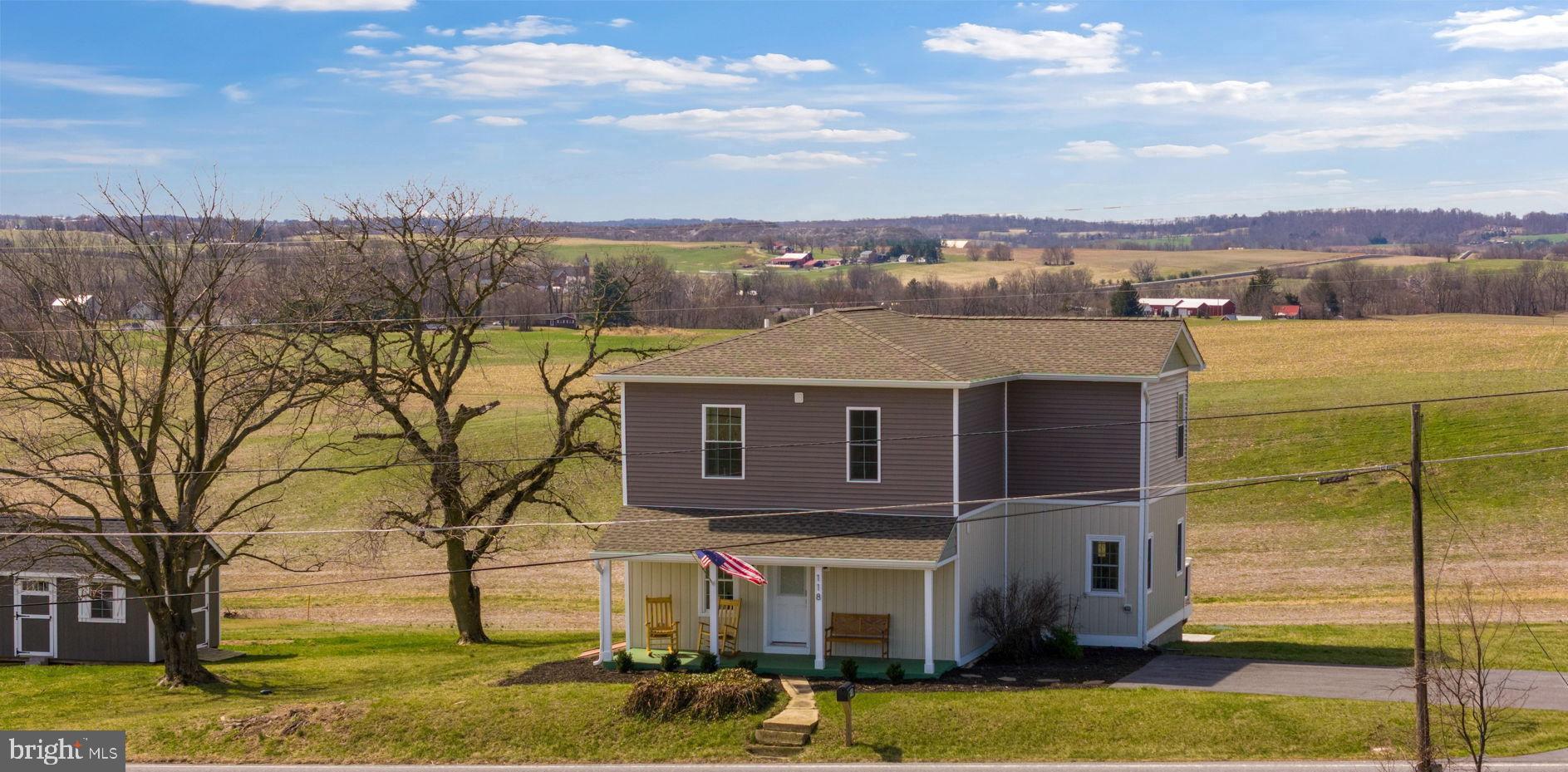 118 South Clear Ridge Road New Windsor, MD 21776 - Photo 2 of 43 a aerial view of a house with a yard
