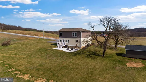 a view of a lake with a yard