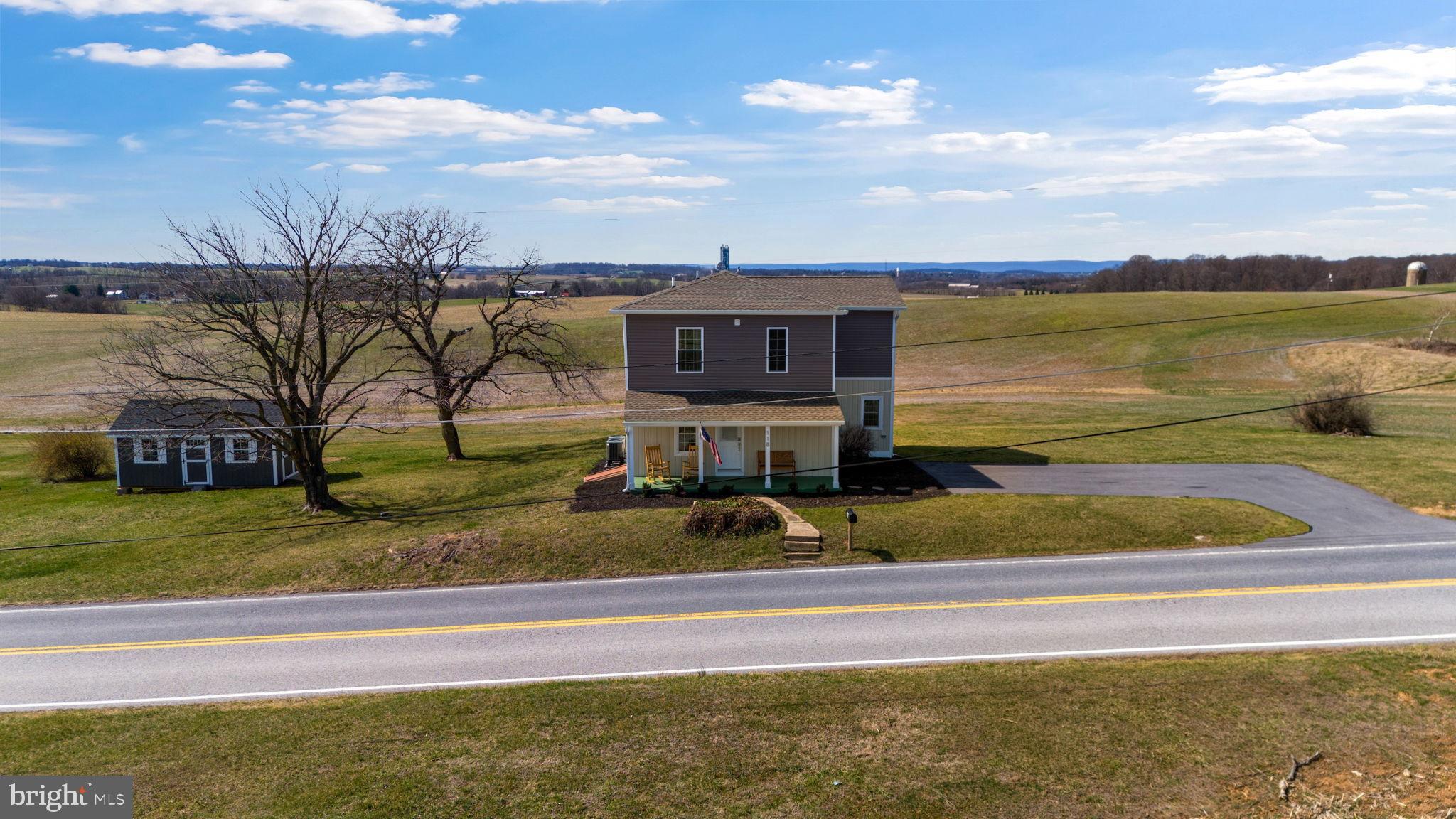 118 South Clear Ridge Road New Windsor, MD 21776 - Photo 42 of 44 a view of a terrace with a lake view