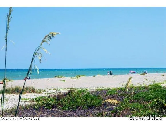 a view of a living room and bathroom