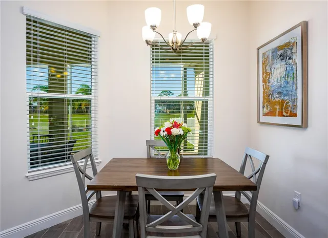 a view of a workspace with furniture