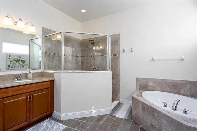 a bedroom with bed and window