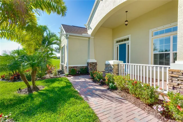 a view of backyard with a garden and plants
