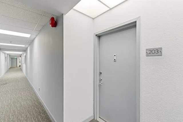 a view of a livingroom with wooden floor