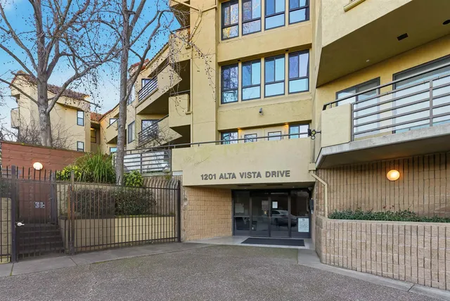 a view of a building with a street