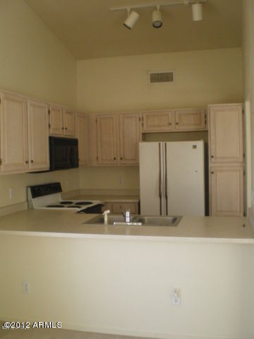 14300 West Bell Road, Unit 327 Surprise, AZ 85374 - Photo 5 of 9 Kitchen 1