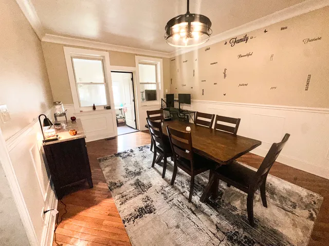 a view of a dining room with furniture