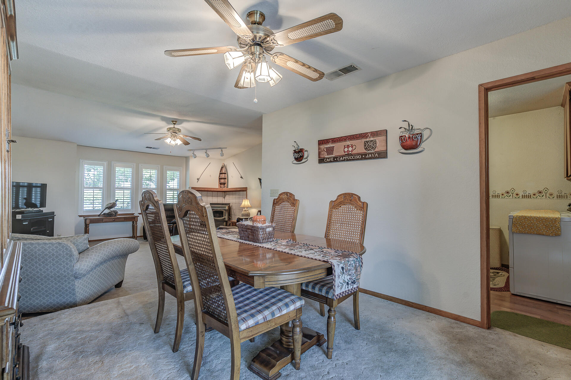 2730 Hall Road Corning, CA 96021 - Photo 11 of 52 a dining room with furniture and chandelier