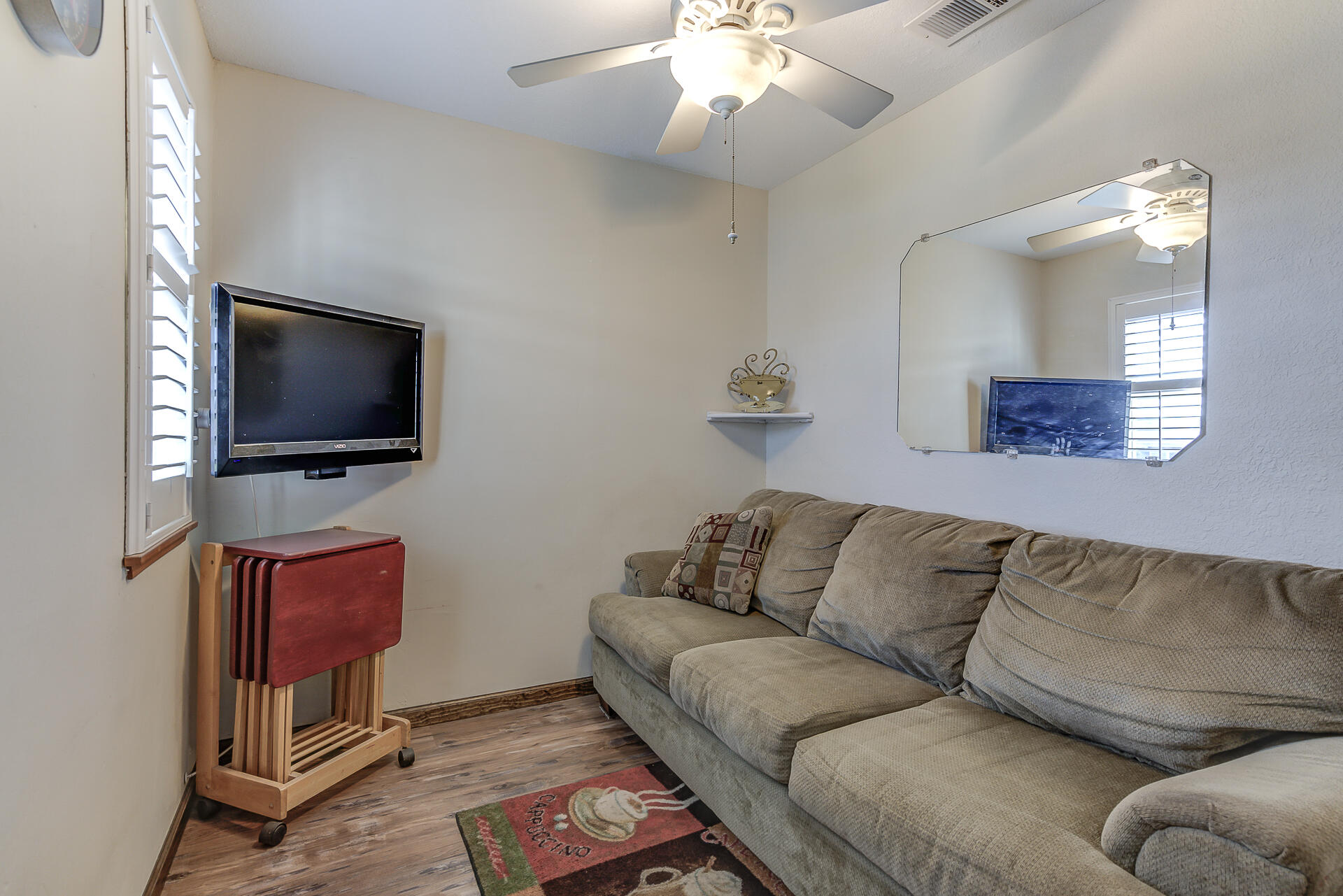 2730 Hall Road Corning, CA 96021 - Photo 20 of 52 a living room with furniture and a flat screen tv