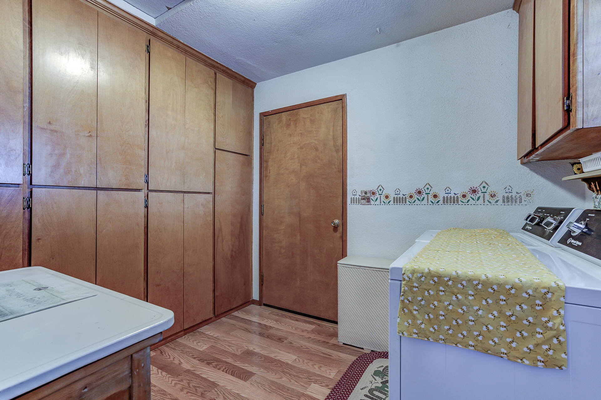 2730 Hall Road Corning, CA 96021 - Photo 22 of 52 a bedroom with a bed and a dresser