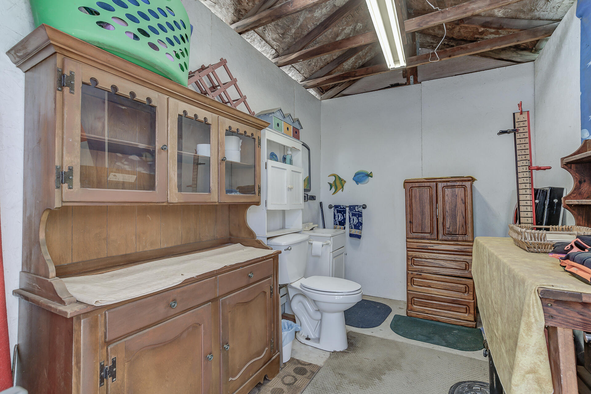 2730 Hall Road Corning, CA 96021 - Photo 23 of 52 a bathroom with a granite countertop toilet sink and mirror