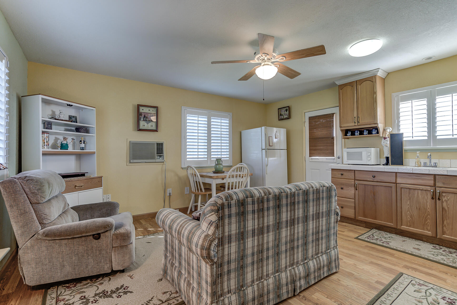 2730 Hall Road Corning, CA 96021 - Photo 25 of 52 a living room with furniture and windows