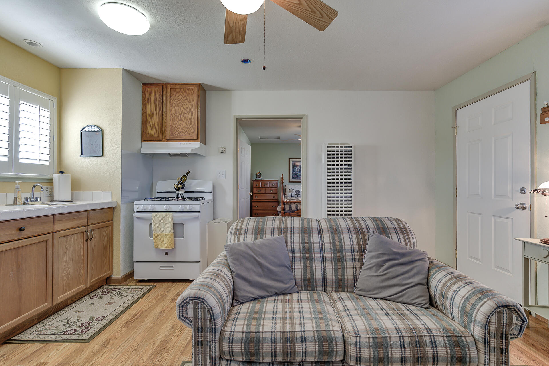 2730 Hall Road Corning, CA 96021 - Photo 28 of 52 a living room with furniture and a window