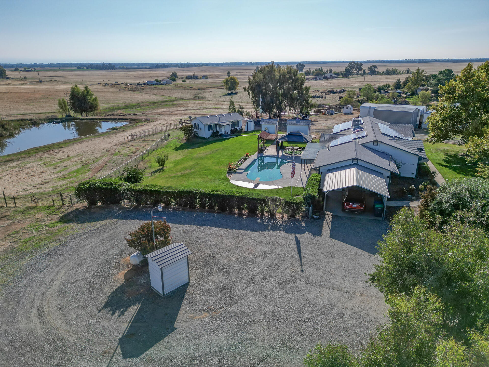 2730 Hall Road Corning, CA 96021 - Photo 3 of 52 an aerial view of a house with garden space and ocean view