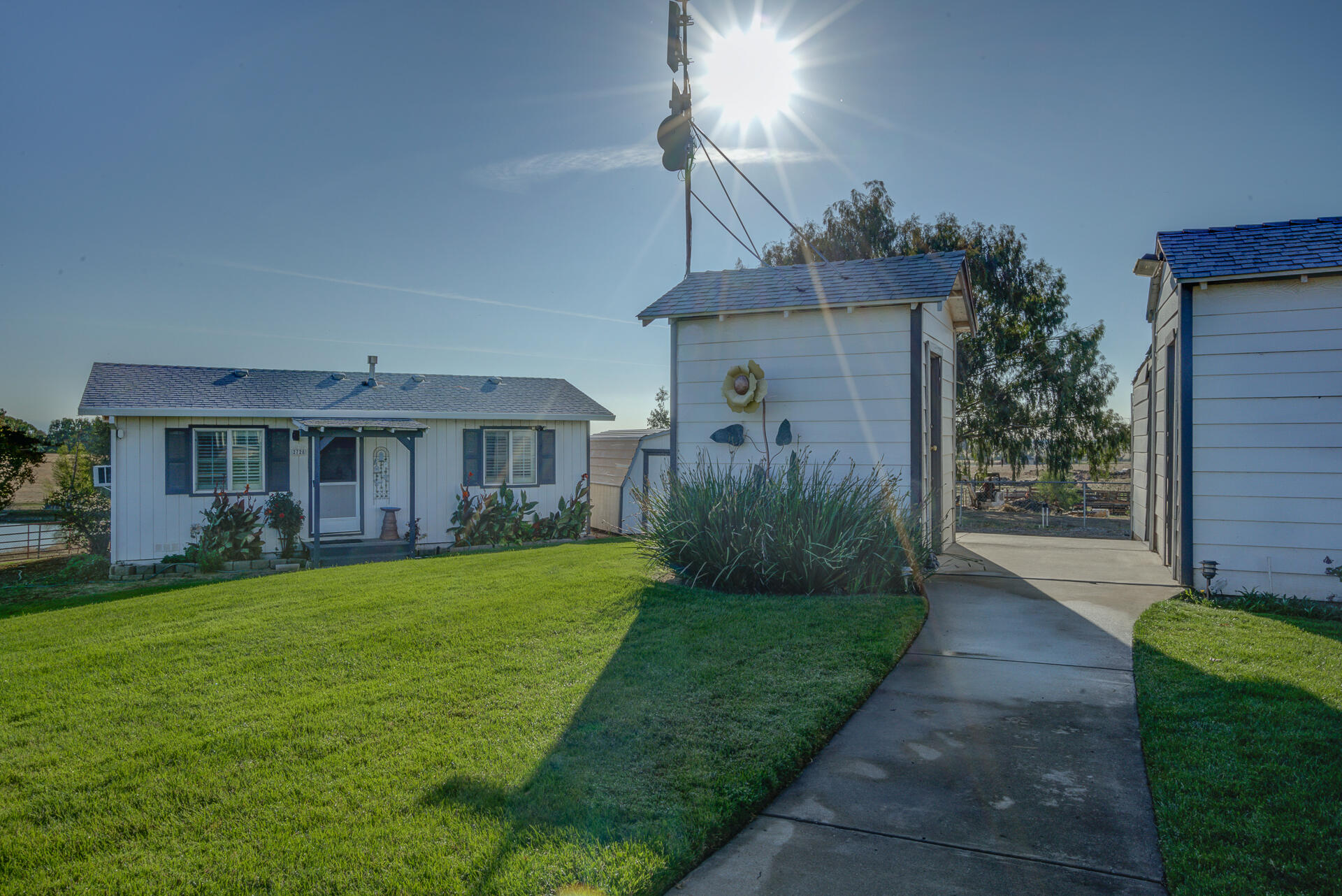2730 Hall Road Corning, CA 96021 - Photo 4 of 52 a view of a front of house with a yard