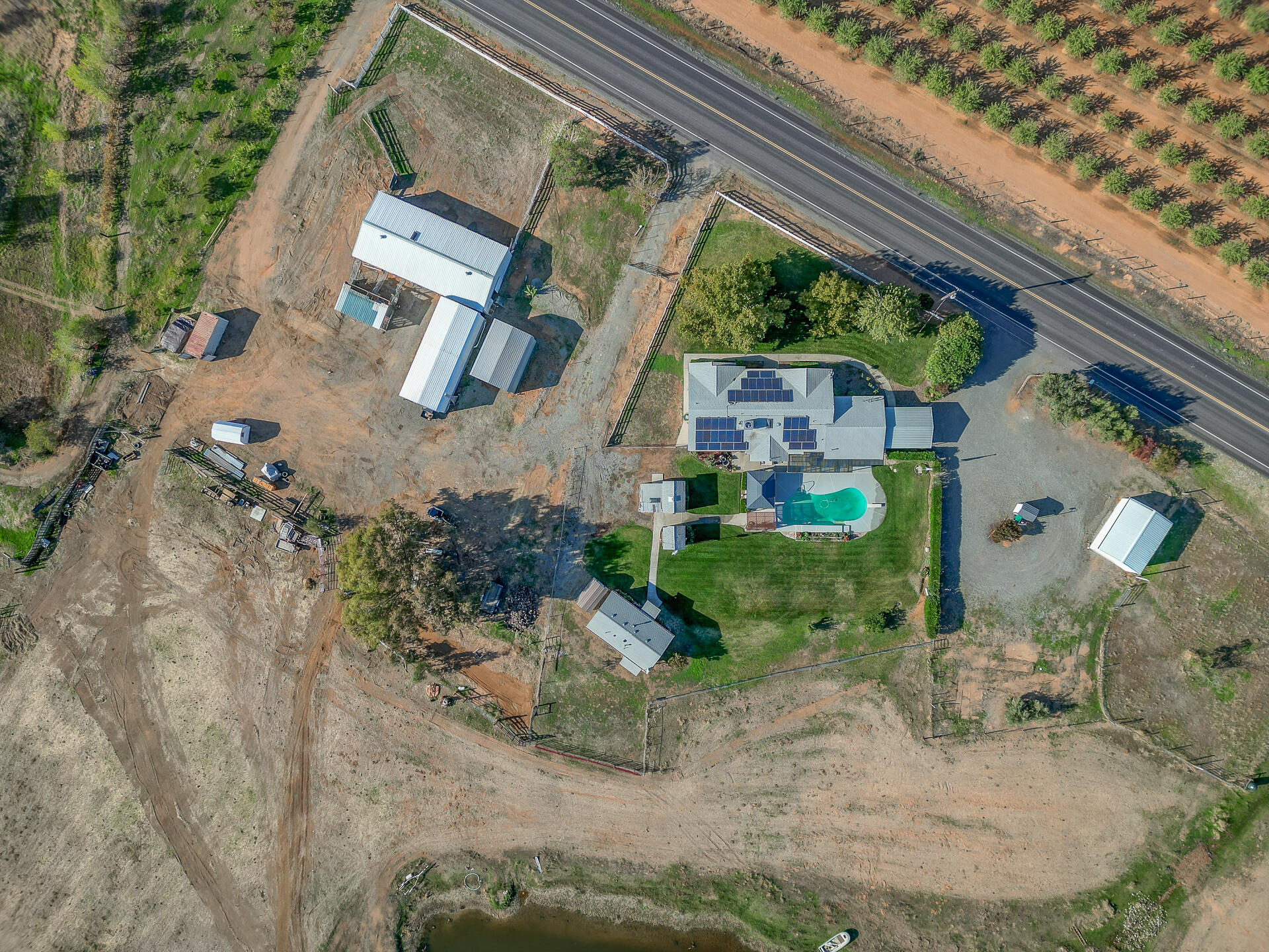 2730 Hall Road Corning, CA 96021 - Photo 47 of 52 an aerial view of a house with a yard
