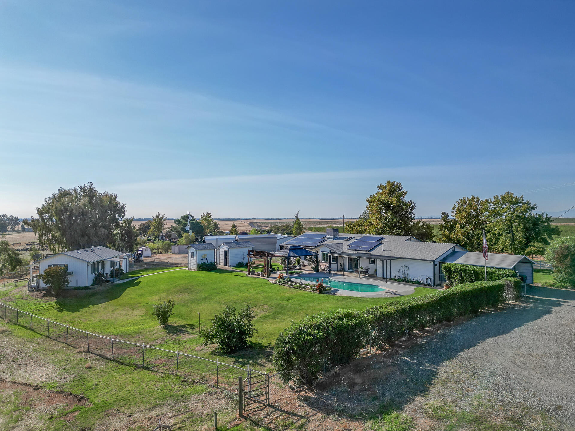 2730 Hall Road Corning, CA 96021 - Photo 49 of 52 a view of a house with a yard