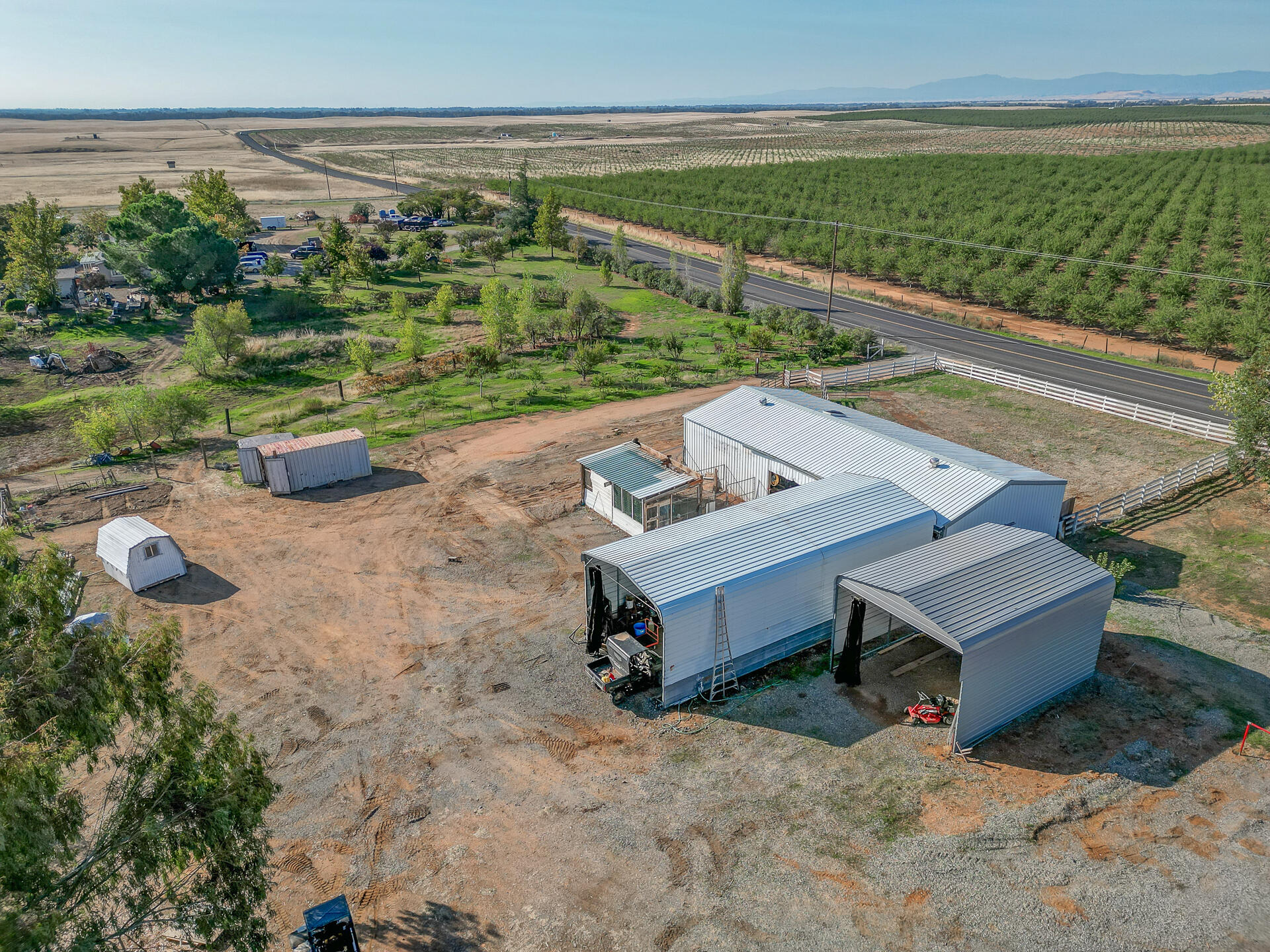 2730 Hall Road Corning, CA 96021 - Photo 51 of 52 a view of a garden with lawn chairs
