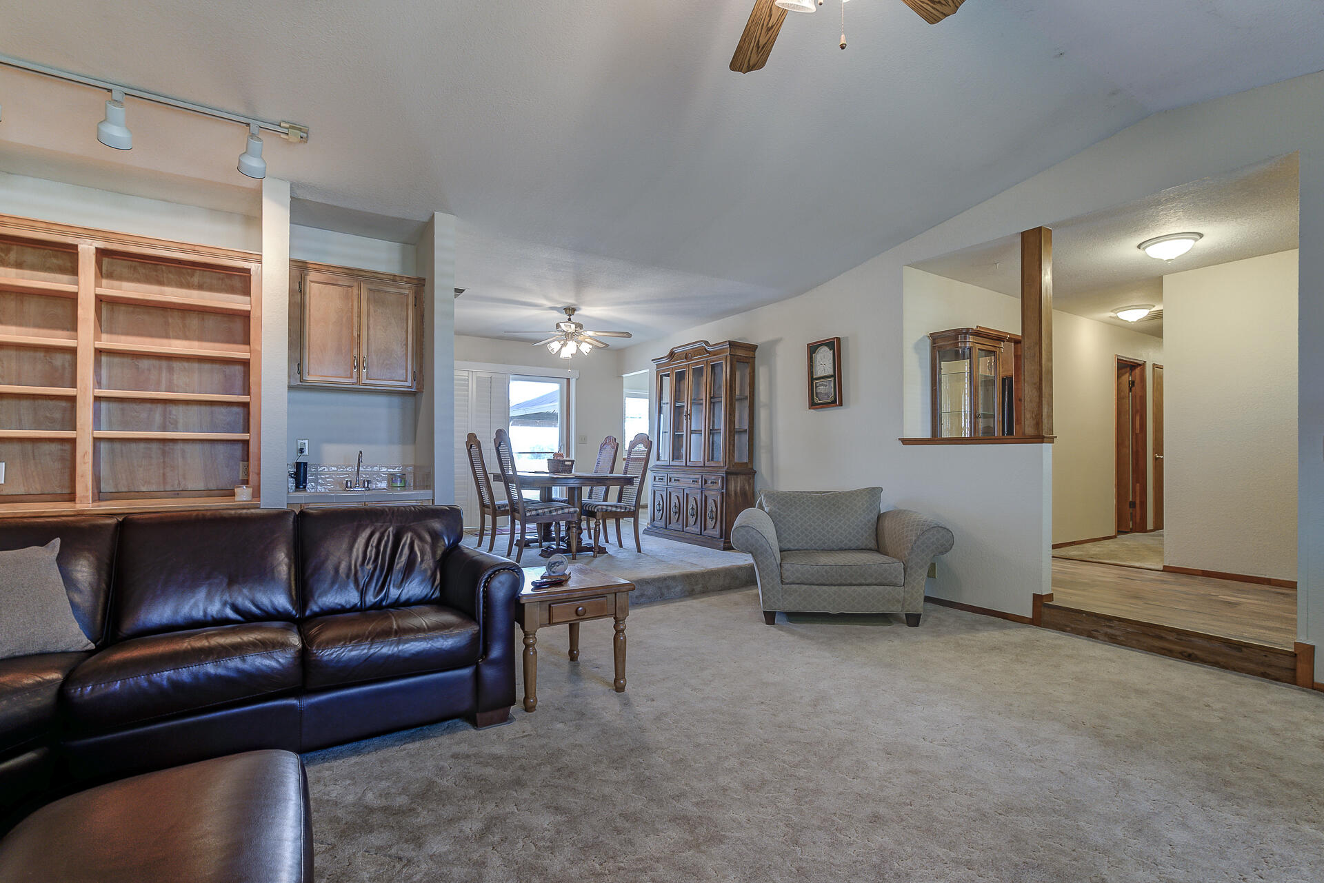 2730 Hall Road Corning, CA 96021 - Photo 10 of 52 a living room with furniture and a potted plant