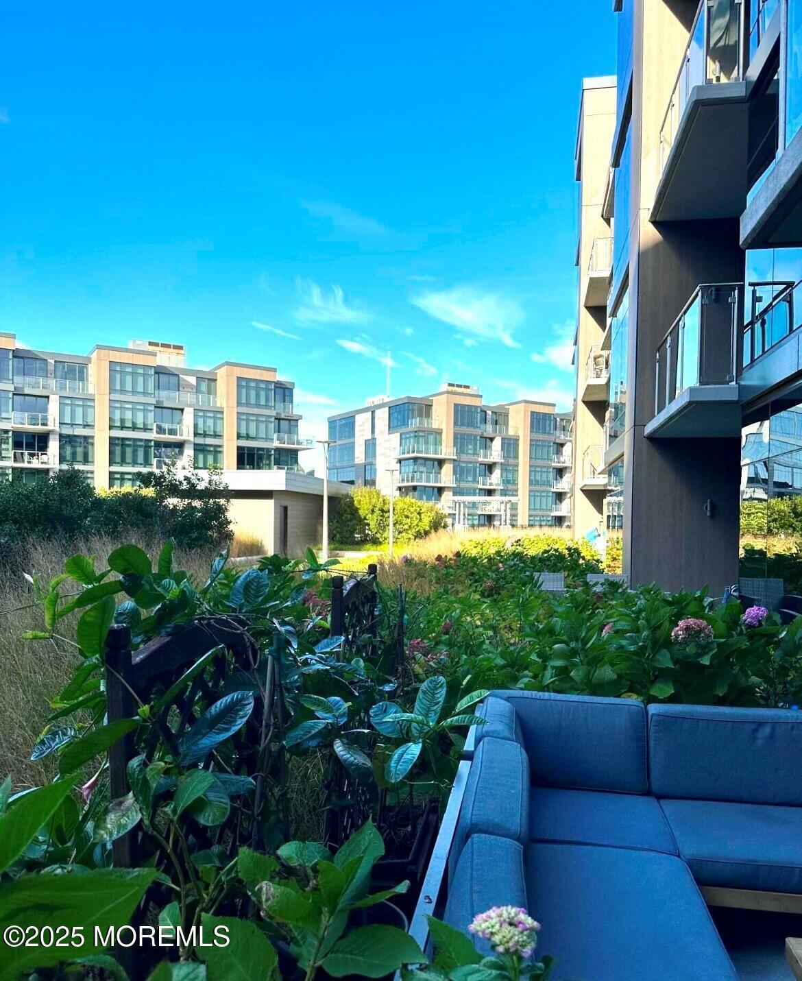 15 Morris Avenue, Unit 204 Long Branch, NJ 07740 - Photo 15 of 26 a view of a yard in front of a building