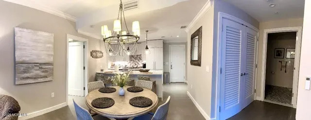 a view of a dining room with furniture