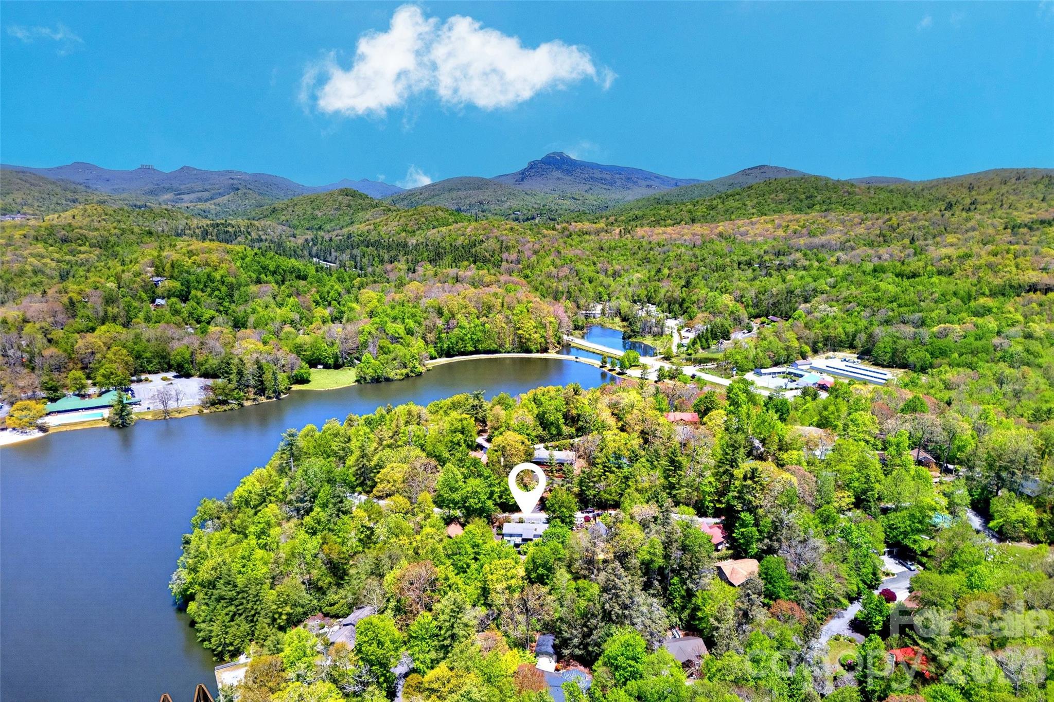 334 Harbor Lake Road Newland, NC 28657 - Photo 42 of 48 a view of a city with mountains in the background