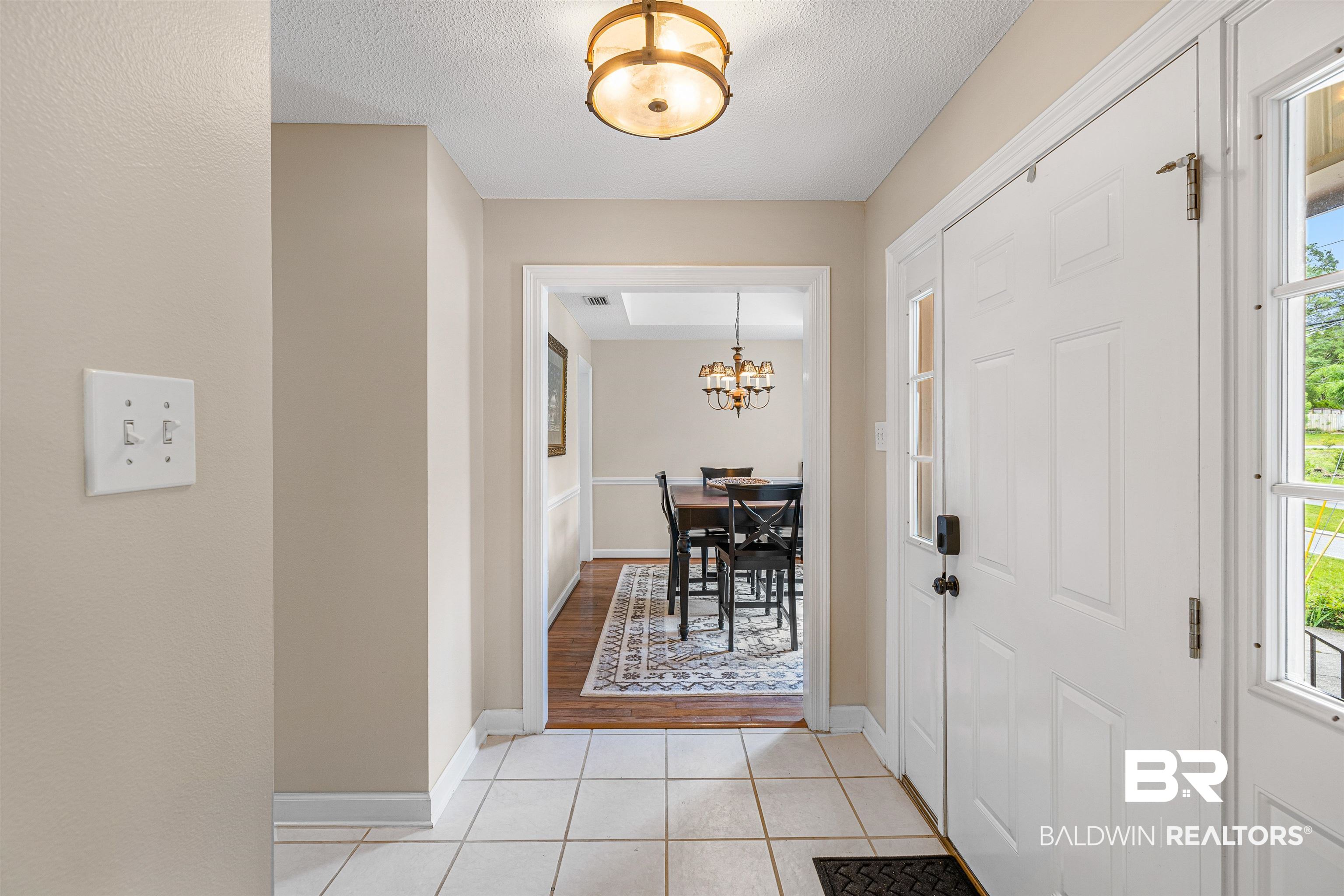 349 Ridgewood Drive Daphne, AL 36526 - Photo 6 of 35 View into the dining room.