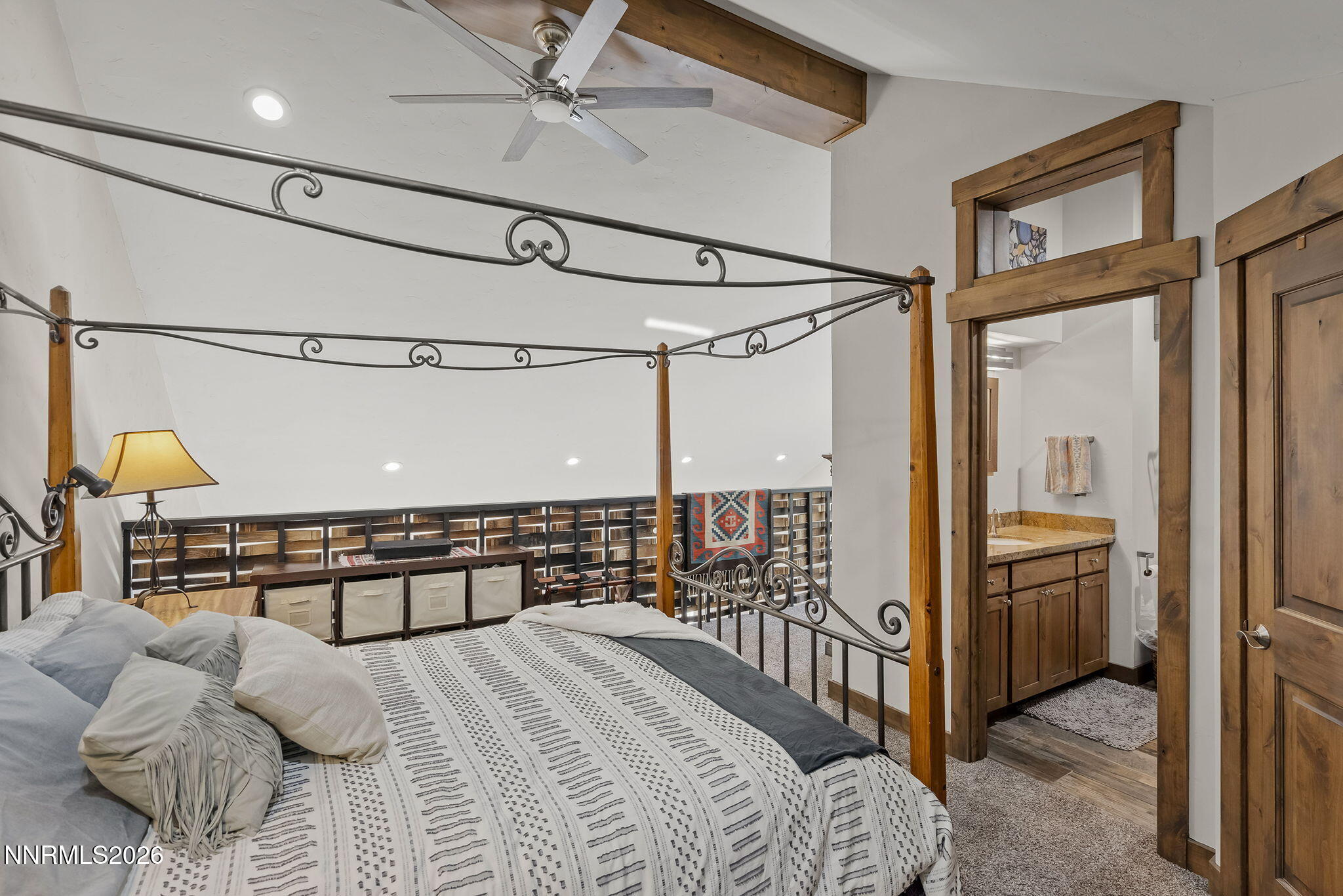 396 Tramway Drive Stateline, NV 89449 - Photo 13 of 19 a bedroom with a bed window and a walk in closet