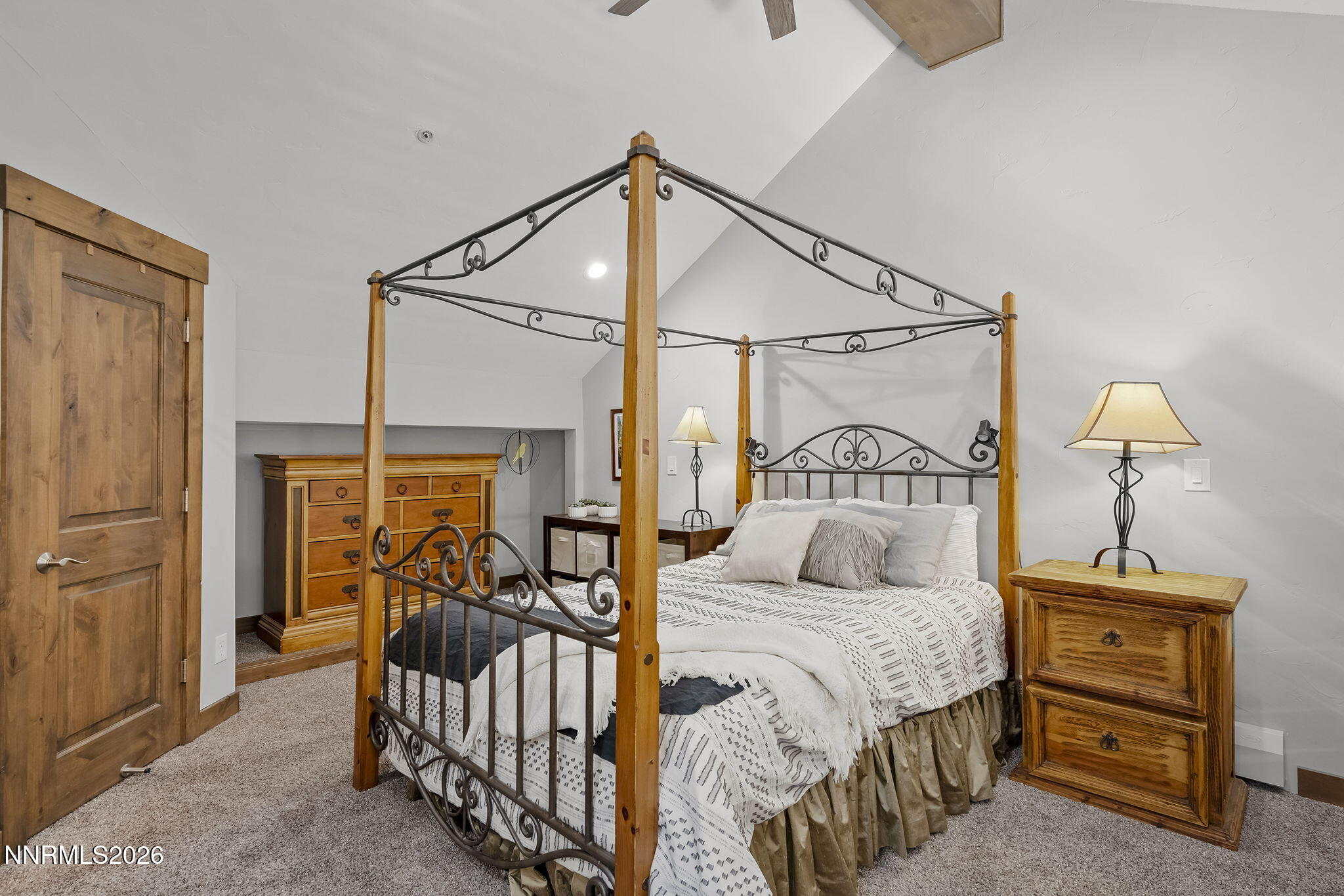 396 Tramway Drive Stateline, NV 89449 - Photo 14 of 19 a bedroom with a bed and a table