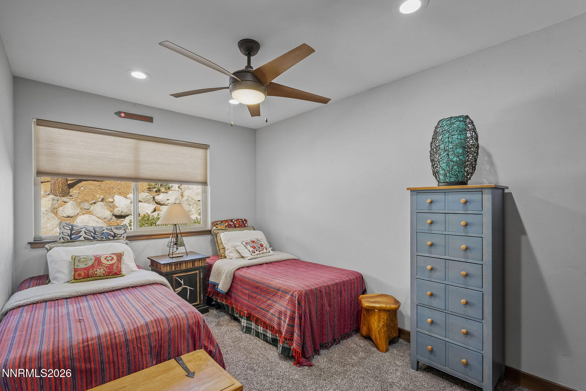 396 Tramway Drive Stateline, NV 89449 - Photo 9 of 19 a bedroom with furniture and a large window