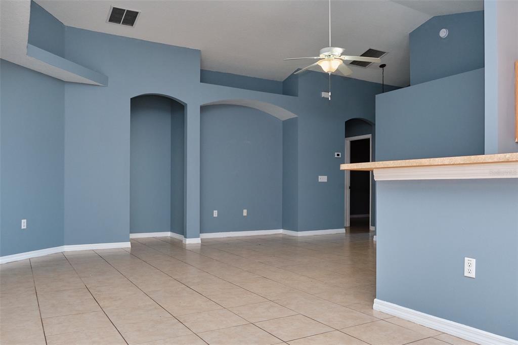 2726 Randal Way Kissimmee, FL 34743 - Photo 12 of 20 a view of a livingroom with a chandelier