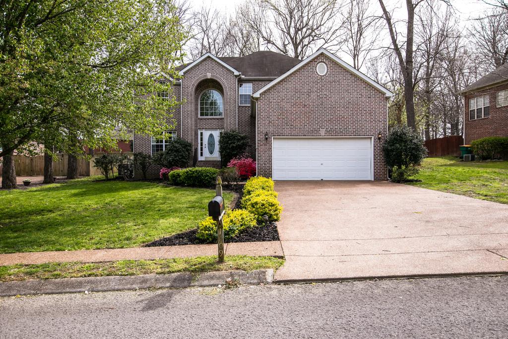 1609 Inverness Drive Spring Hill, TN 37174 - Photo 1 of 30 Welcome to 1609 Inverness Drive in sought after Spring Hill, Williamson County. Notice the neighborhood sidewalks.