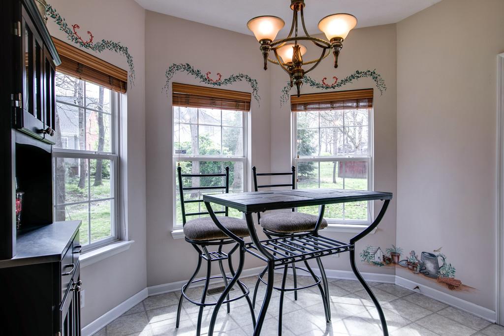 1609 Inverness Drive Spring Hill, TN 37174 - Photo 11 of 30 This bright breakfast nook overlooking the backyard is the perfect spot to enjoy your morning coffee and plan your day.