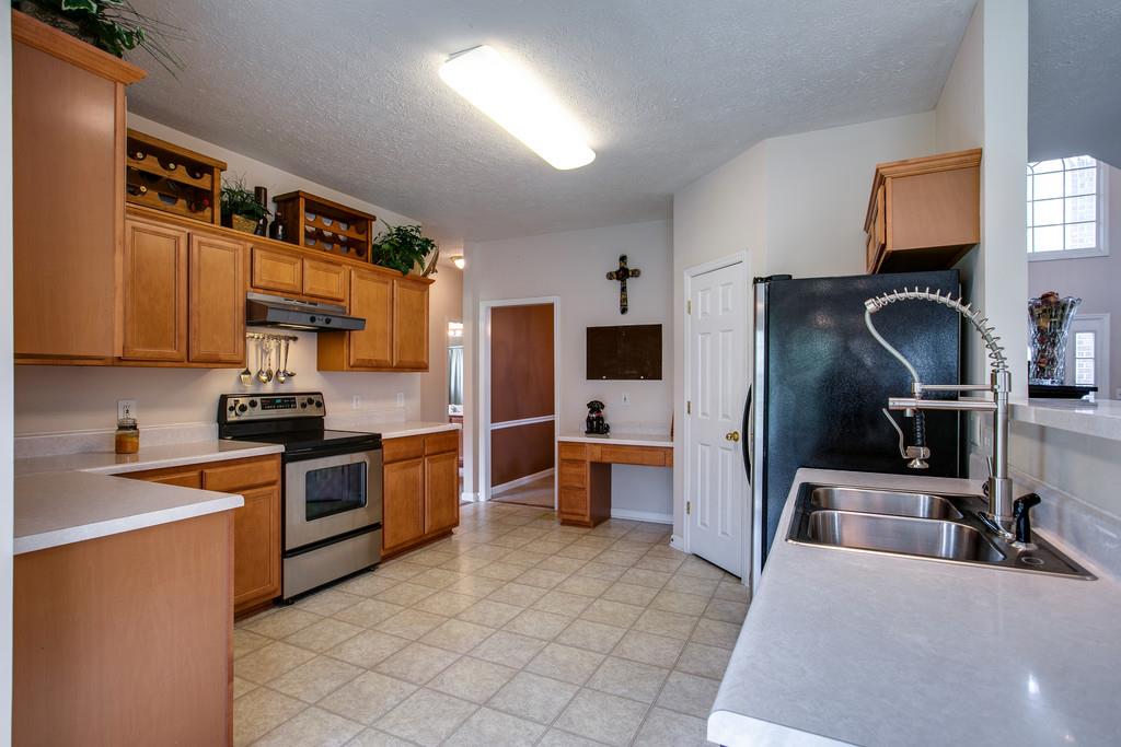 1609 Inverness Drive Spring Hill, TN 37174 - Photo 12 of 30 This kitchen has so much space. There's even plenty of room to add an island if you wanted one.