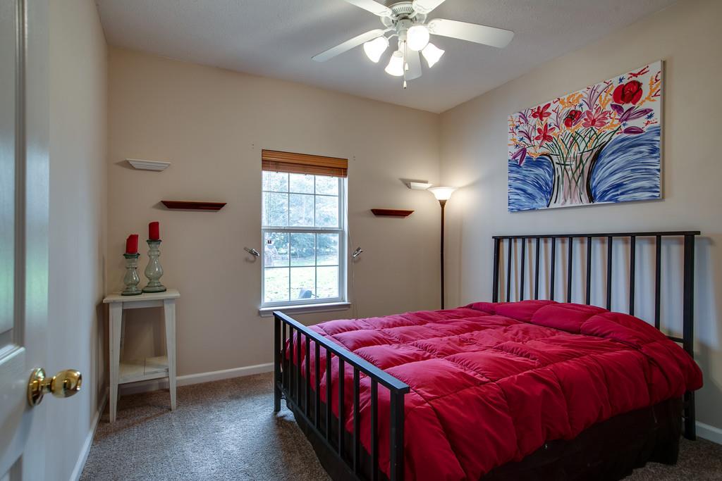 1609 Inverness Drive Spring Hill, TN 37174 - Photo 16 of 30 Off the kitchen and down a little hallway is the only first floor bedroom. Perfect for guests or an older child.
