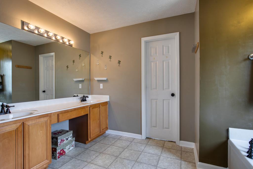 1609 Inverness Drive Spring Hill, TN 37174 - Photo 21 of 30 The attached master bath has double vanities, separate tub and shower, private water closet and walkin closet.