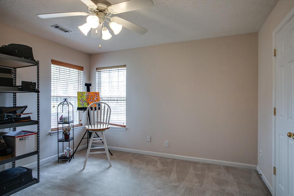 1609 Inverness Drive Spring Hill, TN 37174 - Photo 23 of 30 Bedroom 3 is on the other side of the bonus room from the master and is a great size.