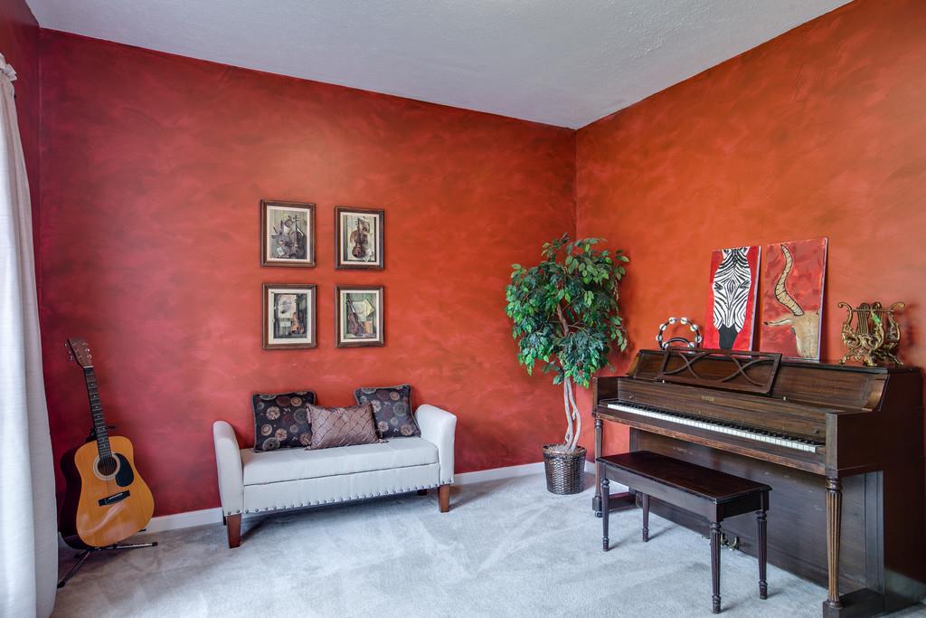 1609 Inverness Drive Spring Hill, TN 37174 - Photo 7 of 30 To the left of the front door is the office or what is currently being used as a music room. What would you use this space for?