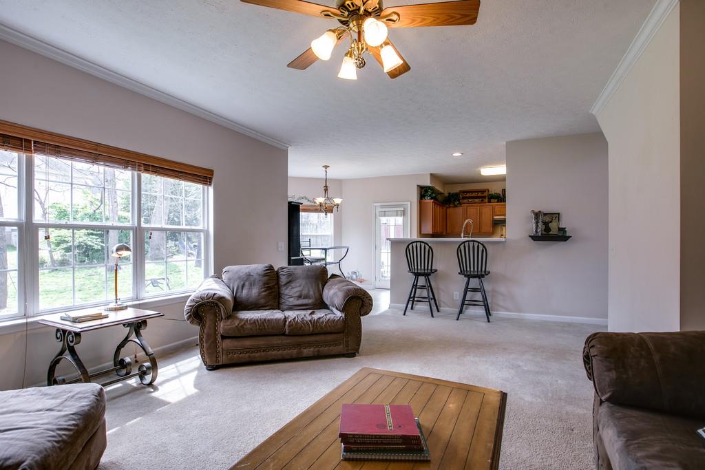1609 Inverness Drive Spring Hill, TN 37174 - Photo 10 of 30 The living room is only steps away from the kitchen. It's the perfect layout for entertaining and enjoying family time.